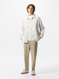 UNIQLO Ультрастрейчевые активные зауженные брюки  фото